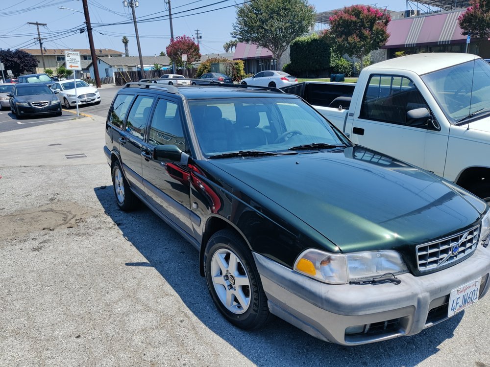 Customer vehicle ready for pickup outside the shop
